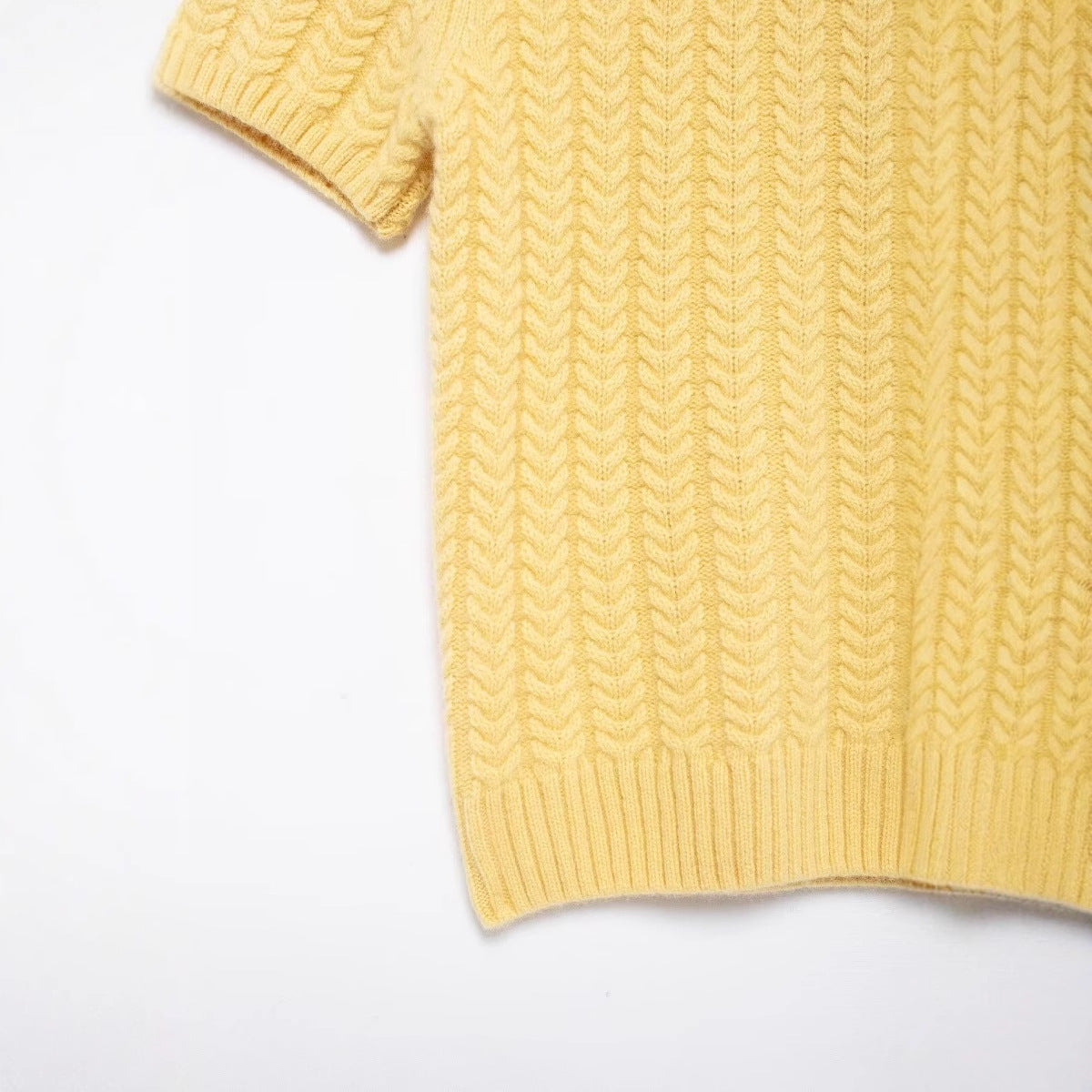 Stylish round neck short sleeved eight strand braided yellow knitted sweater for women